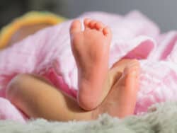 Baby sleeping at Juniors Day Nursery.