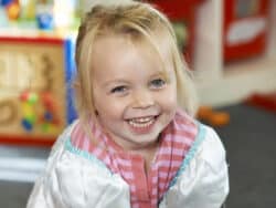 Girl dressing up at Juniors Day Nursery.