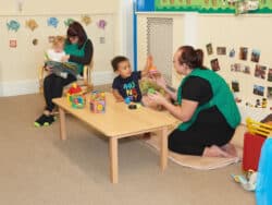 Babies playing in the Teenies Room at Juniors Day Nursery.