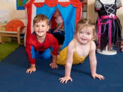 Young Children Dressing up at Juniors Day Nursery.