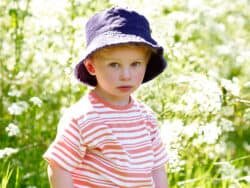 Young Boy in garden at Juniors Day Nursery.