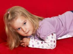 Young girl in toddler room at Juniors Day Nursery.