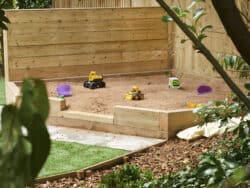 Sand pit in the garden at Juniors Day Nursery.